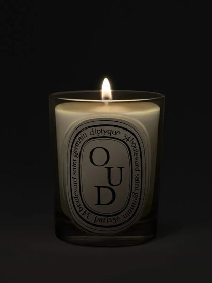 Oud - Classic Candle by Diptyque - candlelit view