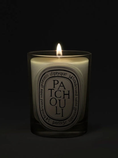 Patchouli - Classic Candle by Diptyque - candlelit view