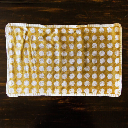 Gold Wax Coated Polka Dot Placemat (22.75" x 14.75")